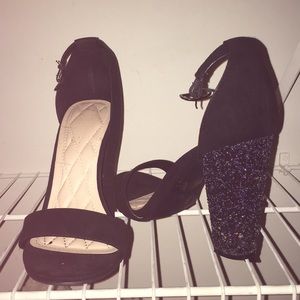 Black suede heels , w/ sparkly heel .